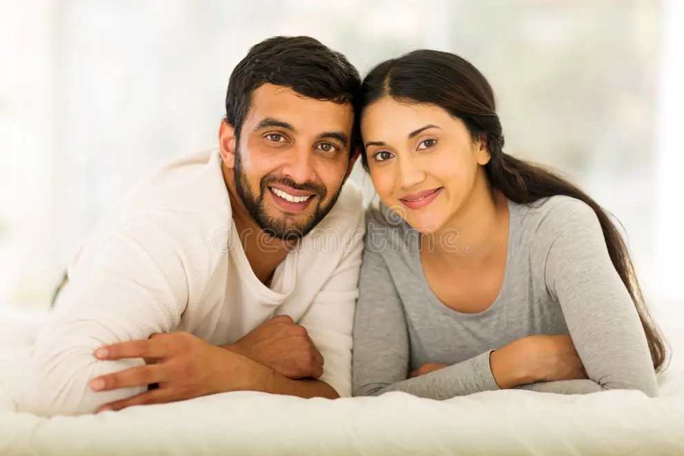 Portrait of the couple smiling together